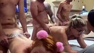 Three hot blondes bent over, giving it up in a wild group session