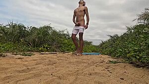 African handjob leads to cumshot on the beach