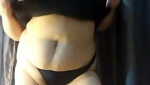 Arriving home, I relax with belly masturbation and orgasm.