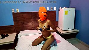 my brunette stepsister tells me she wants to celebrate halloween in a hotel bed she put on a mask and shakes her body and hips very sexy finally she getts naked for me