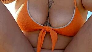 she flashes her tits on the beach to buy goods