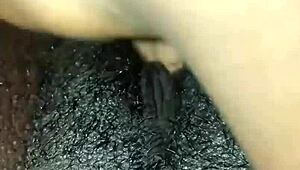 The muscular ebony whore with small tits got wet in homemade solo, masturbating her pussy to orgasm before assfucking.