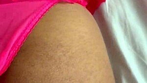 she wears pink lingerie while he penetrates her deeply