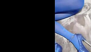 admiring sexy pantyhose paired with blue high heels