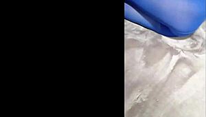 admiring sexy pantyhose paired with blue high heels