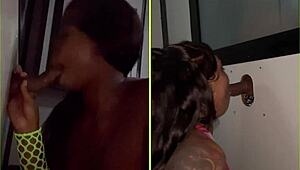 She sucks strangers' big black cocks through the gloryhole, spitting and getting facials