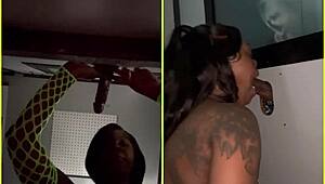 She sucks strangers' big black cocks through the gloryhole, spitting and getting facials