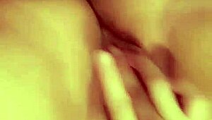 is this redhead slut fingering her hairless pussy for you?