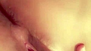 is this redhead slut fingering her hairless pussy for you?