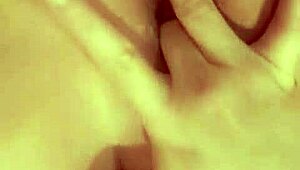 is this redhead slut fingering her hairless pussy for you?