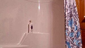 A sneaky video captures me preparing for a relaxing shower in the bathroom.