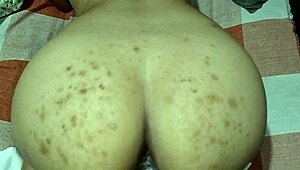 I bend over the beautiful brunette on the sofa.