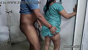 A beautiful Indian wife enjoys a dance in her sexy dress