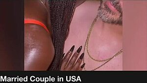 Kiimainen musta malli suukapuloitu ja kahleissa ratsastaa lasidildoa pillua lellien