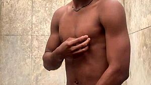 amateur gives soapy massage to big cock in shower, nearly caught