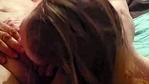 sexy redhead hints at deepthroat while sucking cock and licking balls. She teases with masturbation on ass.