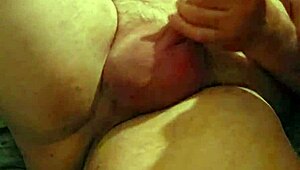 sexy redhead hints at deepthroat while sucking cock and licking balls. She teases with masturbation on ass.
