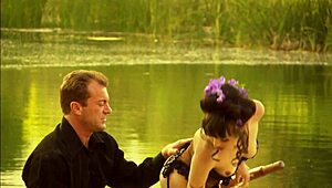 Cytherea takes it doggystyle in a canoe. Her lingerie barely holds on during fingering.