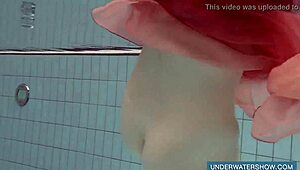 katya okuneva looks amazing in her red dress by the pool