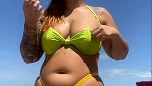 Oh, flashing my big pussy on the beach!