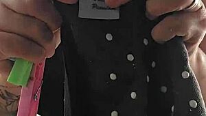 Exhibitionist flashing ass under skirt on balcony