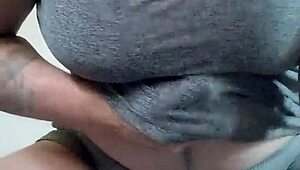 Thekinkyfuckers tattooed brunette wife contrasts her natural tits and boobs while fucking that huge dildo.