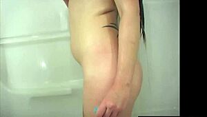 Does she finger her pussy in the shower?