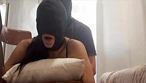 the preview shows her chairtied, hooded, and ballgagged before taking a big rod in every opening.