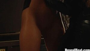 Gagged tied up lesbian slave whipped by dominant madame