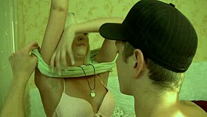 Hey, that blonde teen is just chilling on the bed comfortably.