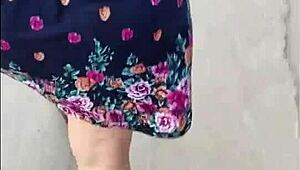 Madura flashes upskirt in street skirt on public sidewalk then offers herself for outdoor fun