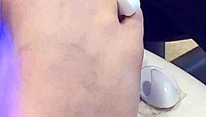 want to watch this shemale getting her feet done in a hot fetish session?