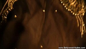 Beautiful brunette from Bollywood dances in a cute teasing way.