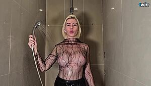 Blonde with huge tits teases in shower with transparent top coat dry and wet try on haul see through clothes