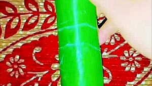 She explores with a cucumber in homemade setup as cute exotic slave