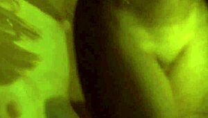 an exotic brunette lover from india dances seductively, teasing with her erotic striptease and undressing in a softcore display.