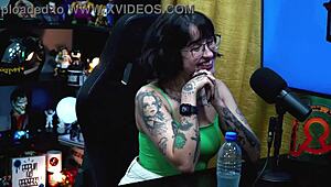 Martina Olivera offers two reais or a mysterious gift in her outdoor public podcast interview. She chats in the shack with teen guests.