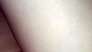 In a homemade video, an amateur pregnant milf experiences a quick slap in an intimate moment.