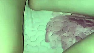 In a homemade video, an amateur pregnant milf experiences a quick slap in an intimate moment.