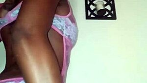 Lola performs a seductive ebony striptease dance, ripping clothes in petite solo undressing.