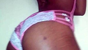 Lola performs a seductive ebony striptease dance, ripping clothes in petite solo undressing.