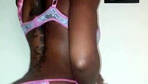 Lola performs a seductive ebony striptease dance, ripping clothes in petite solo undressing.