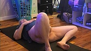 Hot milf stretches in early morning yoga session