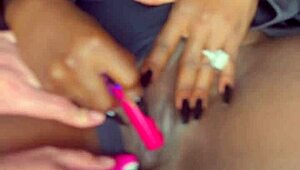 Sexy black model shoves vibrator deep in shaved pussy for white guy watching!