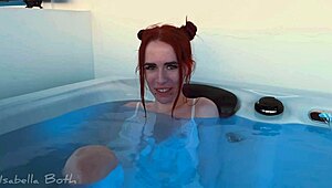 redhead couple starts kissing in jacuzzi then she sucks small cock underwater