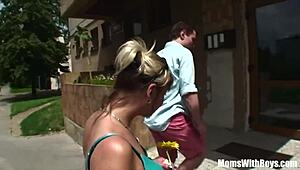 Blonde European mature suggests double fun with young cocks