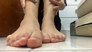 Removing my black socks slowly while spitting on my teasing feet in this POV fetish session