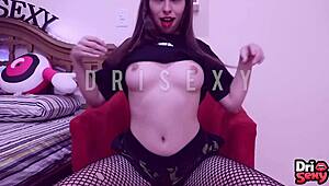 Young girl dances in short shorts and pleasures herself sensually
