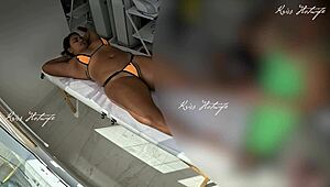 Massaging with Micro Bikini Shoved Deep in Pussy