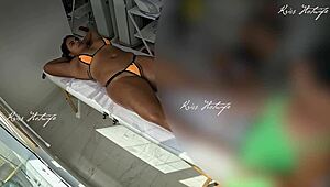 Massaging with Micro Bikini Shoved Deep in Pussy